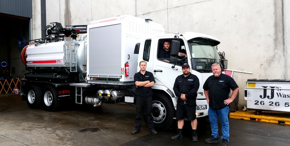 The PS Equipment support team in front of an STG HDV6000 pump truck.